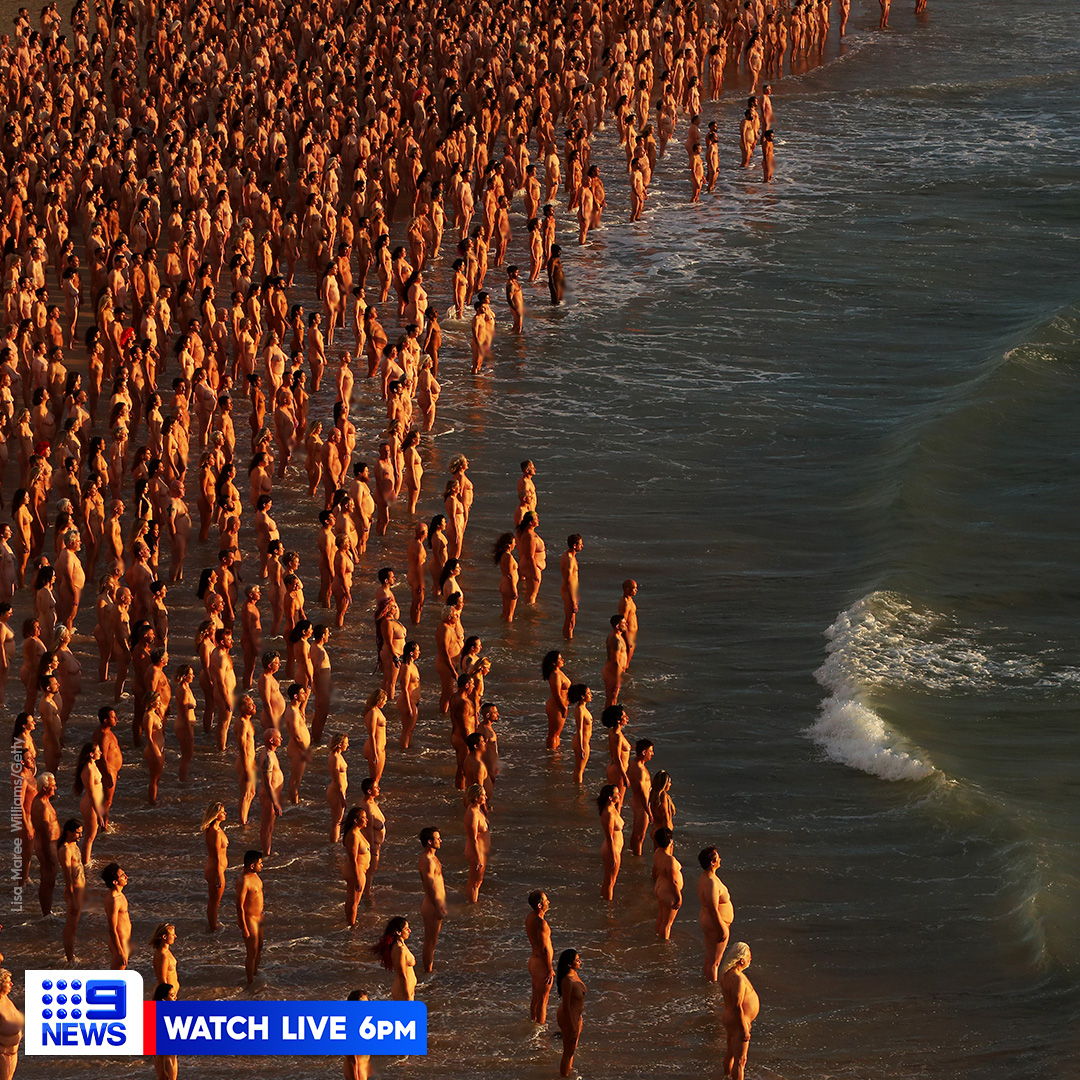 9NewsSyd's tweet photo. Today Bondi Beach is legally classified as a nude beach for the first time in history for an art installation featuring hundreds of naked people.
 #9News https://t.co/BzucgT4Uy4 https://t.co/aY6aSbY30z