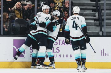 Eberle, Berniers, and oleksiak hug after a goal