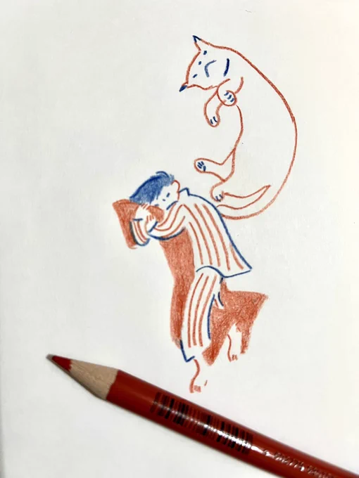 寝子赤青鉛筆で描いています。 