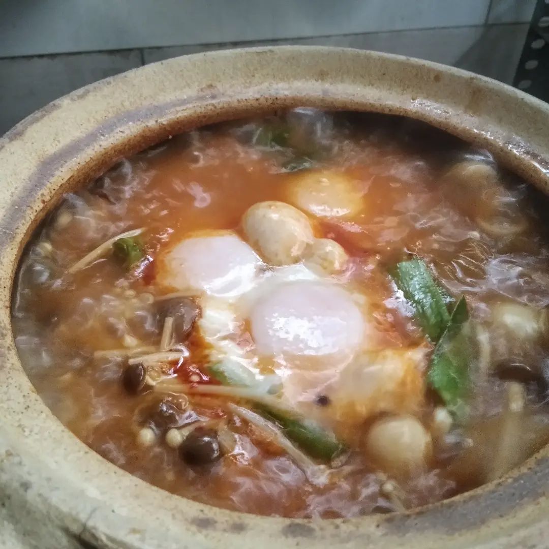 KantoiDax's tweet photo. Just made my version of Sundubu Jjigae with telur ayam kampung. Now bubbling away in my trusty ol' claypot https://t.co/YJ54t37Kpp