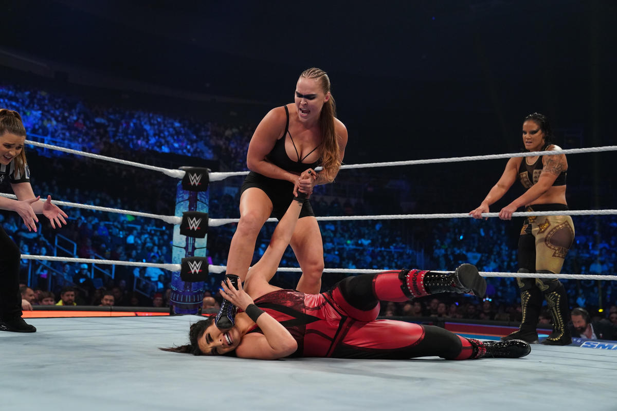 .<a href="/RondaRousey/">Ronda Rousey</a> &amp; <a href="/QoSBaszler/">Shayna Baszler</a> attacked <a href="/ShotziWWE/">Jesus alfaro</a> &amp; <a href="/RaquelWWE/">Raquel</a> backstage before their match on #SmackDown. Rousey locked Rodriguez in the Armbar and further damaged her injured limb, causing a tap out. #SSWWE