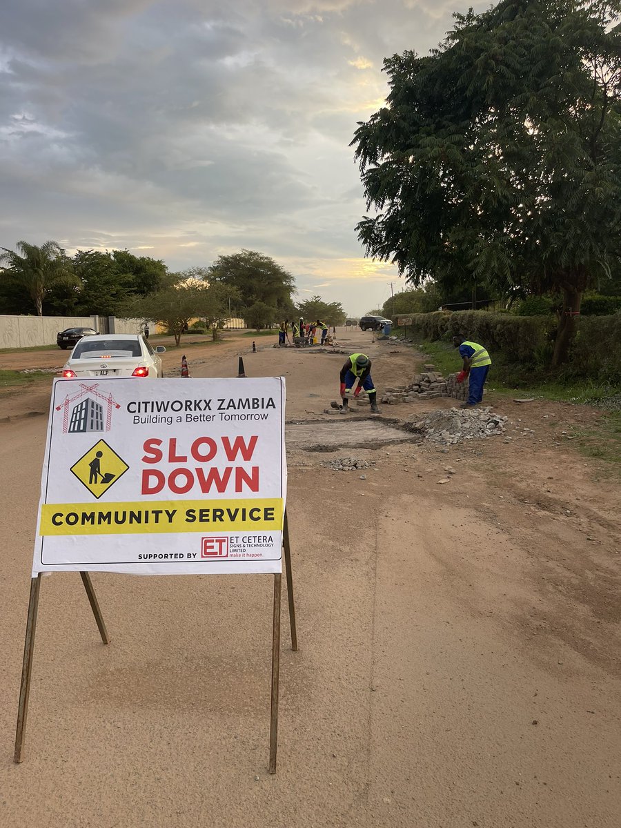 citiworkx's tweet photo. Our 2022 Annual Community Service Project, we picked a crucial road, Jambo Drive, Riverside, Kitwe. 
We approached the Kitwe City council with an usual proposal, to fix the potholes with “pavers”. Not only did They welcome it, they jumped on it with us. We received overwhelming.. https://t.co/cRnRPbSuye