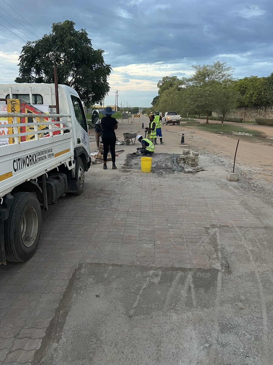 citiworkx's tweet photo. Our 2022 Annual Community Service Project, we picked a crucial road, Jambo Drive, Riverside, Kitwe. 
We approached the Kitwe City council with an usual proposal, to fix the potholes with “pavers”. Not only did They welcome it, they jumped on it with us. We received overwhelming.. https://t.co/cRnRPbSuye