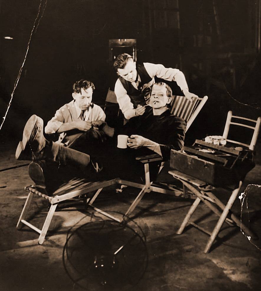 Boris Karloff in a rare behind the scenes photo during his makeup session by legendary makeup artist Jack P. Pierce for Universal's cult horror classic from 1931, FRANKENSTEIN