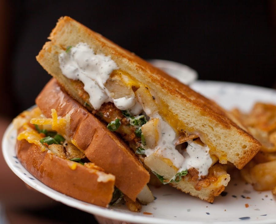 All the classic deliciousness of a baked potato in sandwich form. Try this amazing dish stuffed with home fries, bacun bits, sour cream, green onions, and melty cheese — with ranch dressing on the side! 😋

#spiraldiner #comfortfood #yum #smallbusinesssaturday