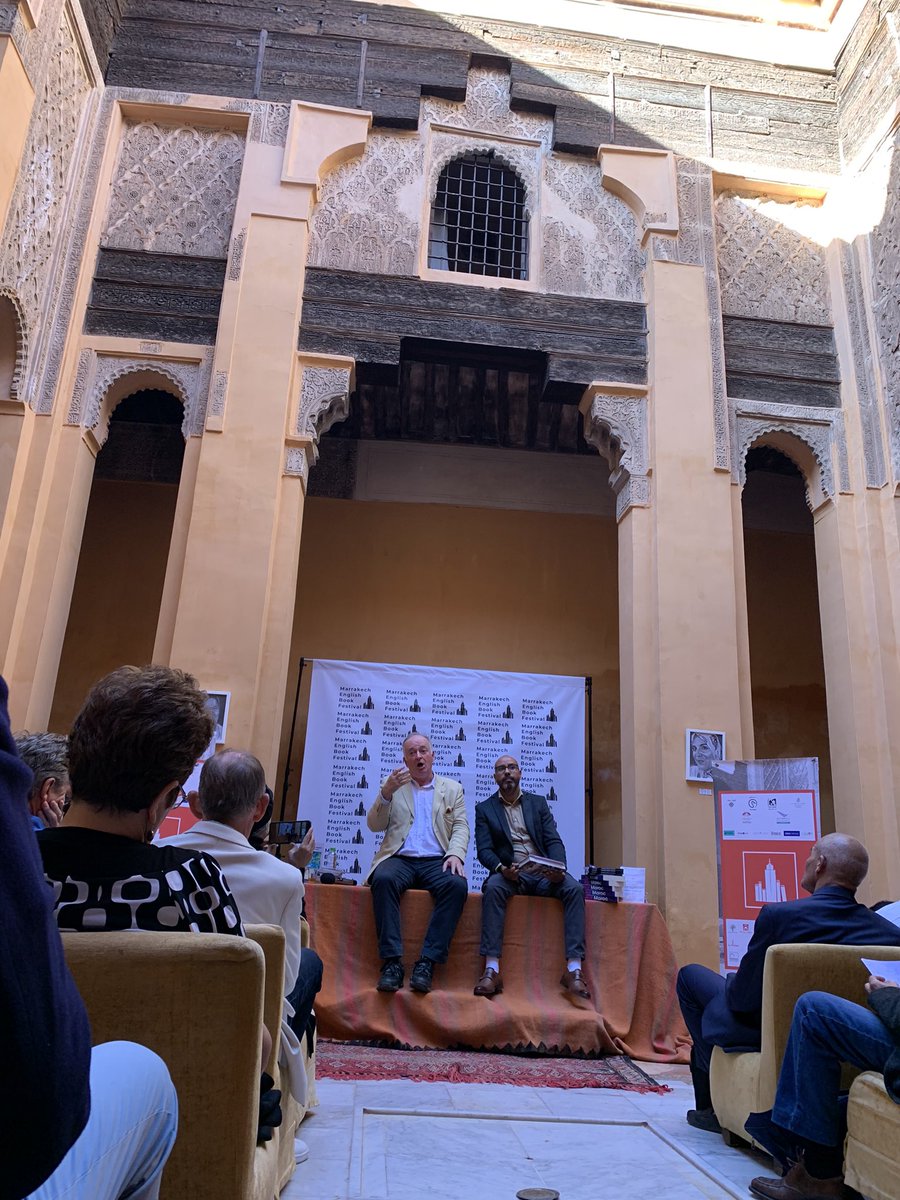 UKSimonMartin's tweet photo. Wonderful to listen to author and historian @BarnabyRogerson in interview before a live audience at #DarCherifa #MEBF https://t.co/u50WtXRKDV