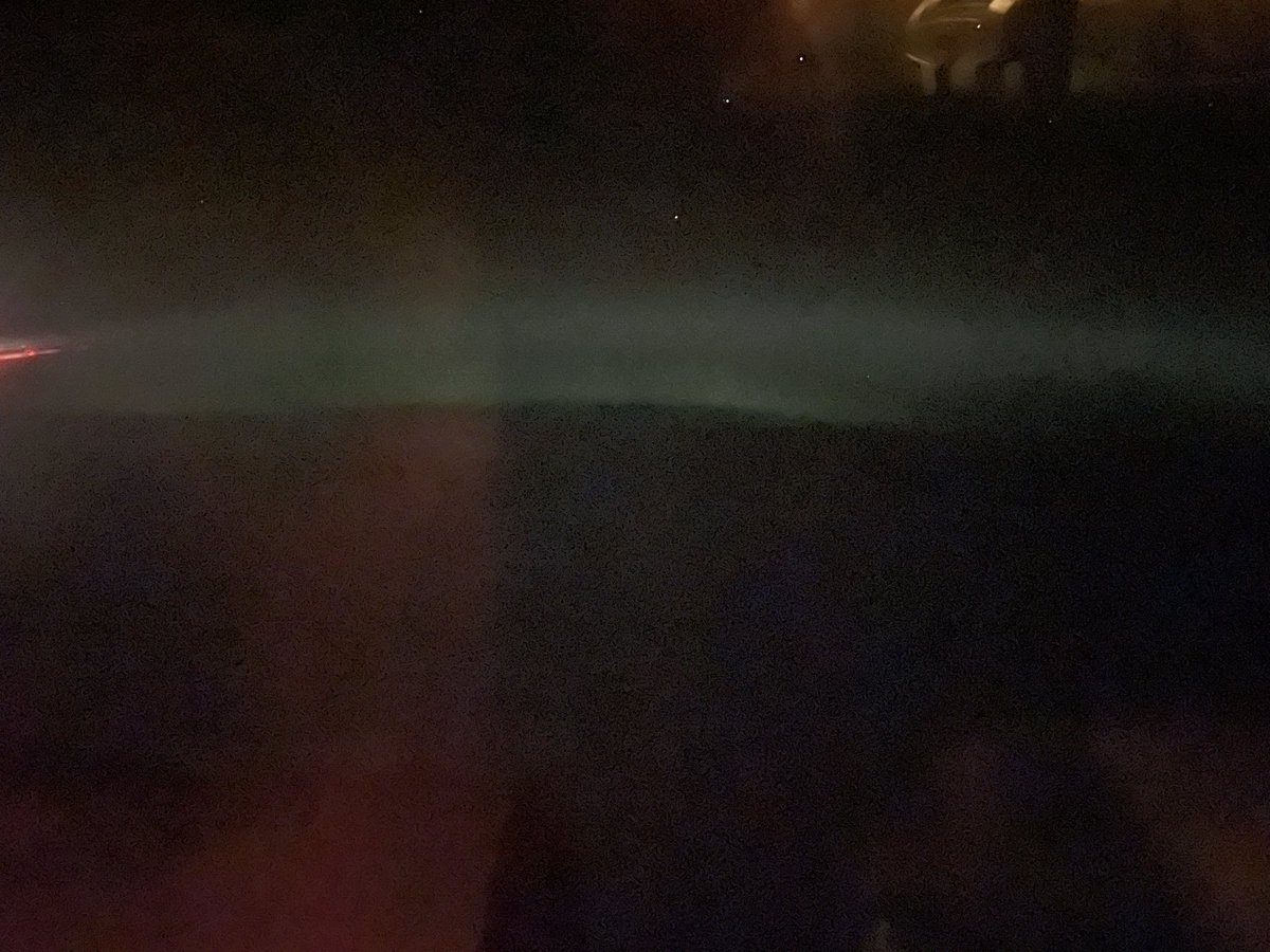 donewithretail's tweet photo. @coffee_anytime Northern lights last night on a plane from Calgary to Winnipeg https://t.co/Y5LXIcuLsR