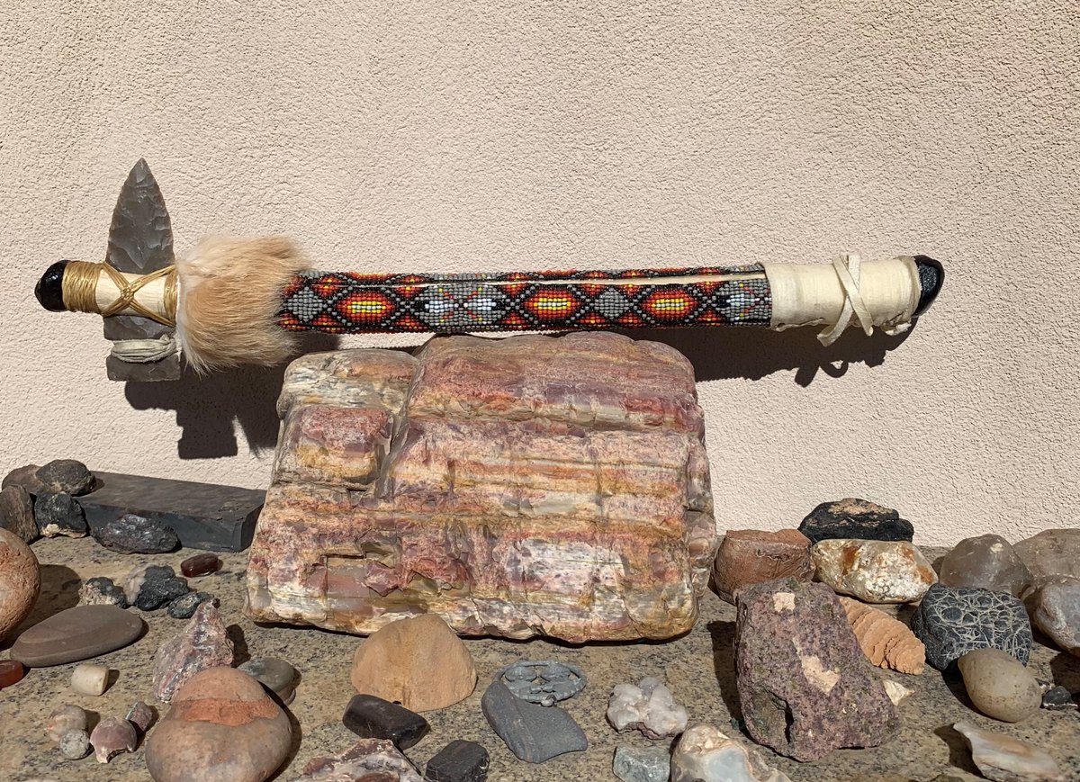 Just finished last night and I gave it to a good friend today ,Martin Doka <a href="/kickingbass13/">Kickin Bass</a>. Texas flint head , beaded handle rawhide grasp , rabbit fur and Apache tears on both ends.  #flintknapping