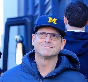 WolverineChron's tweet photo. Here is Harbaugh walking into the Horseshoe this morning. This dude knew the whole time. https://t.co/6JLDBJ1rKA