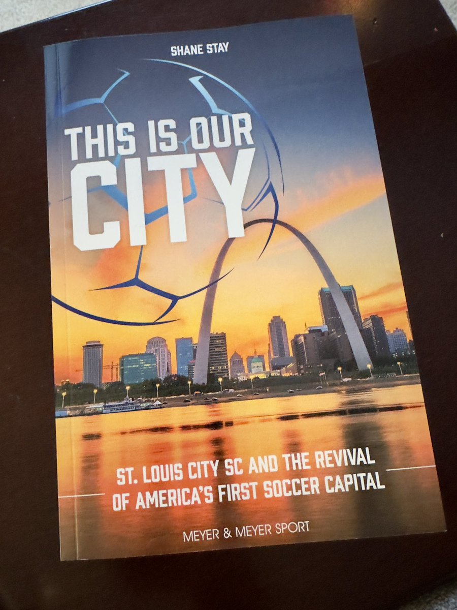 MattBakerSTL's tweet photo. A gift from my mom. Skimming this, my interest is definitely piqued. By @ShaneStay, a narrative of STL soccer culminating in #stlCITYsc along with places of interest, MLS info, rosters and stats. Excited to dive into this one. https://t.co/Tyjswt0MxD
