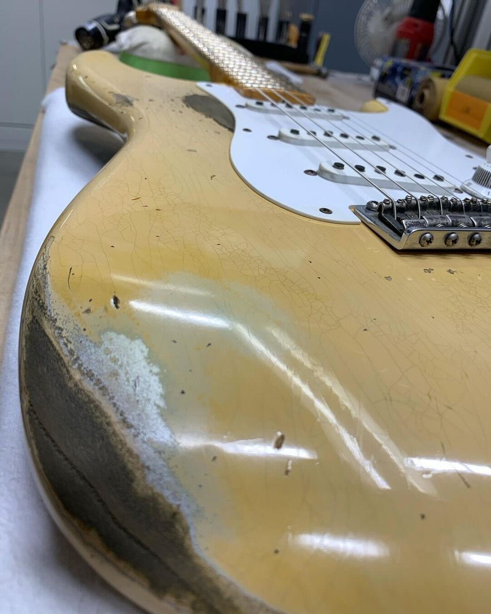 Fender's tweet photo. Celebrate #Straturday with Levi Perry and his first NAAM build. Fun fact, some of the early Desert Sand Strats were actually finished with a Silver undercoat, which is what this one is based off of. https://t.co/d8tsVbbyBB