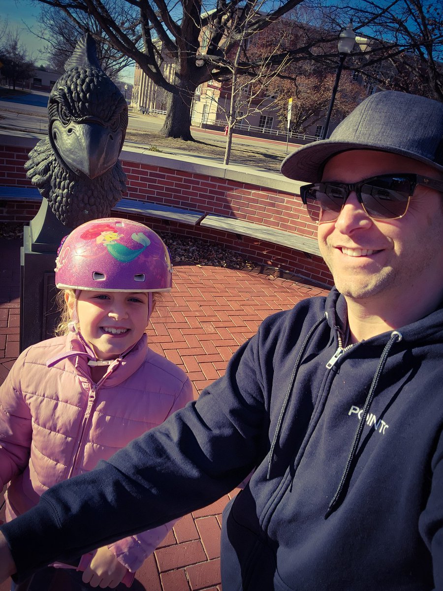 Spent some 1:1 time with Eyla today. We took advantage of the AMAZING weather and rode e-scooters around the <a href="/IllinoisStateU/">Illinois State</a> campus. We had to make a stop at Redbird Plaza and take a picture with Reggie. Go State! 🔴⚪️