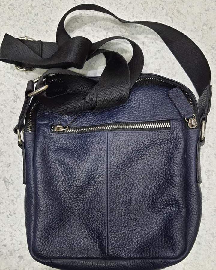 Real leather traveling bag and leather jacket 
sakamaonline.com