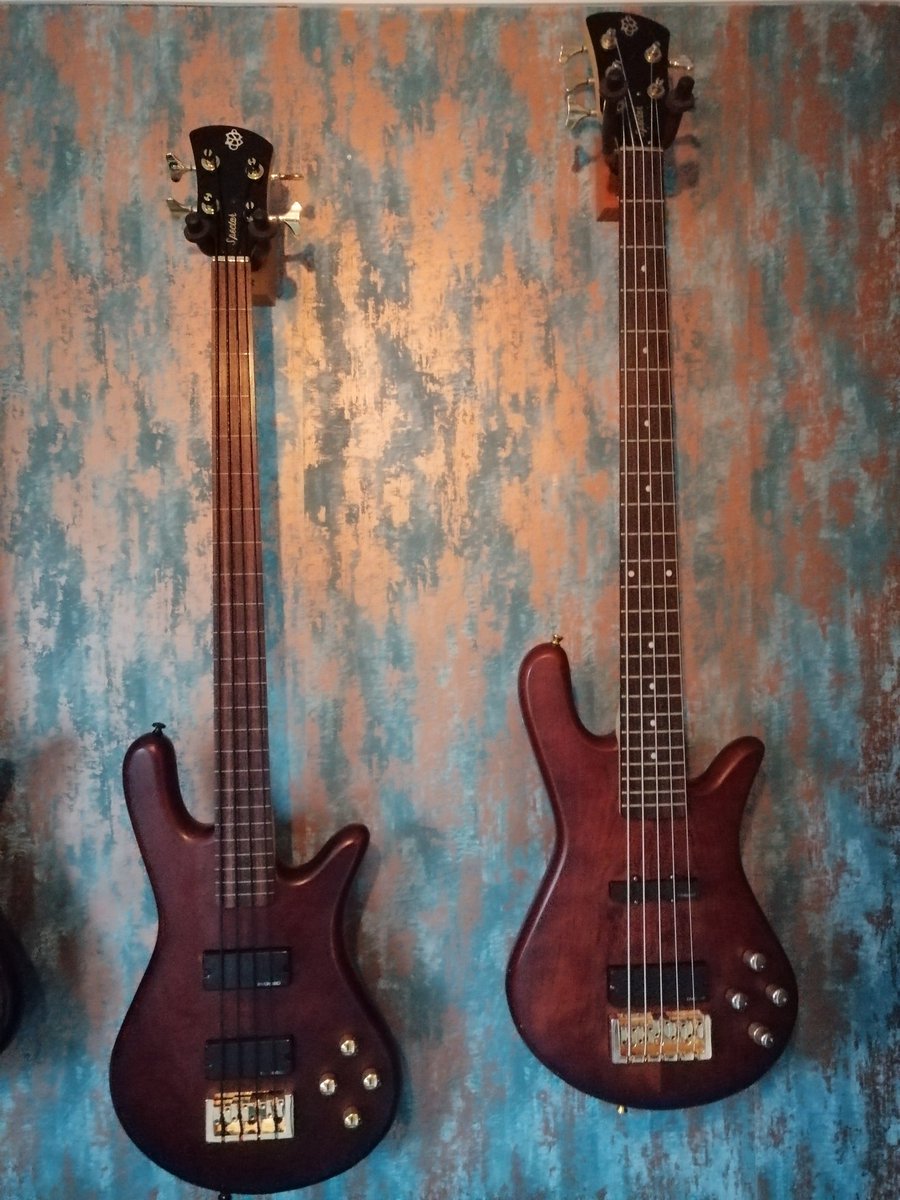 Niko_B's tweet photo. Just saved this Spector Legend 5string Classic I think, from a life of misery. Slight twist in the neck but, all sorted now. Different pick up configuration I've seen, it's had a deep clean and set up. Plays and sounds good. I may turn it in to a fretless like the one on the left https://t.co/GxUfeF3czM