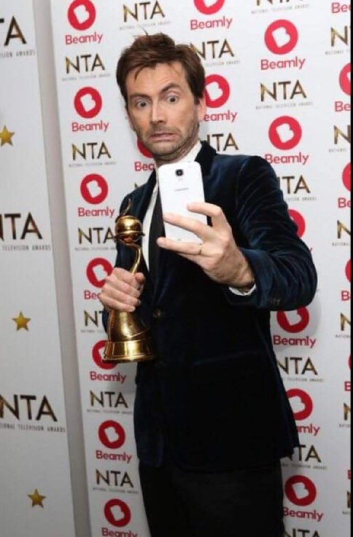 david tennant taking a selfie looking concerned reaction meme
