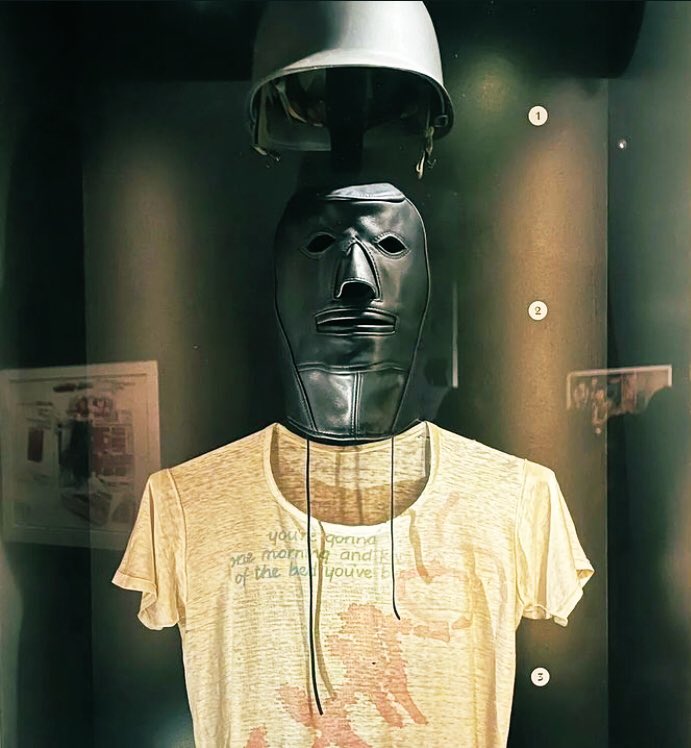 RKovitch_'s tweet photo. And here is the same mask in ‘The Horror Show’ Exhibition currently @SomersetHouse. Bowie also appears alongside Jordan in the same show (photo: Kypros, 1978). https://t.co/ICHHYNdDdg