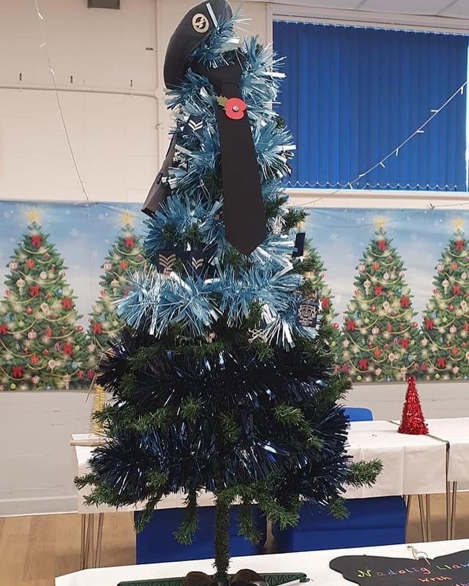2475Sqn's tweet photo. This weekend 2475 Sqn were invited to enter a best dressed Christmas tree competition. The tree was dressed to look like a cadet with dark blue tinsel to represent trousers/skirt, light blue tinsel for the Wedgwood shirt with a tie, beret, brassard &amp; badges completing the tree. https://t.co/0kCLlg8bV1