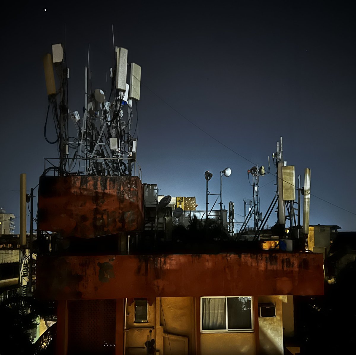 acdesai's tweet photo. Is such a high density of telco towers on a single building in a dense residential area safe for residents of buildings around this building? @DoT_India @AshwiniVaishnaw @jagograhakjago https://t.co/EE8gv0kt5i