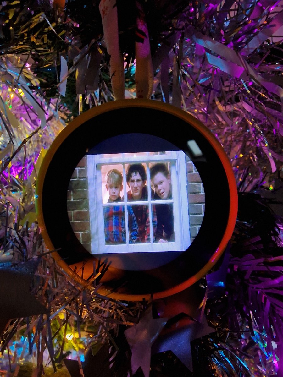 tomqman's tweet photo. @pimoroni finally put my hyperpixel round to good use as a Christmas bauble that plays Christmas movies and shows https://t.co/LOFslXFnUr