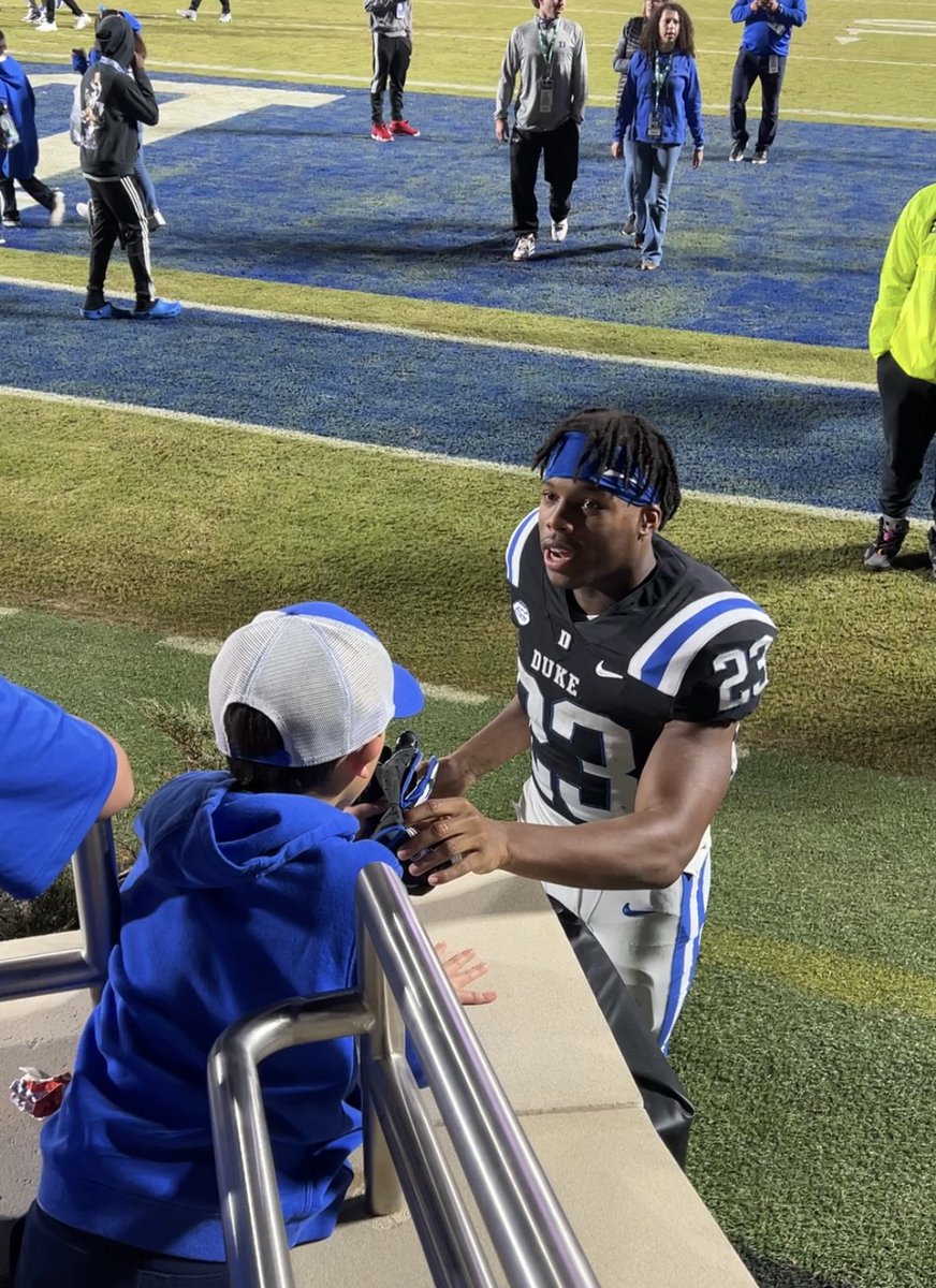 dukefanclee's tweet photo. Asher’s reaction says it all! This is what it’s ALL about…. moments we’ll never forget. Thank you @TerryMoore02 and @DukeFOOTBALL #GoDuke #BleedBlue #DukeGang #DukeFootball https://t.co/0fLhV9nmLE