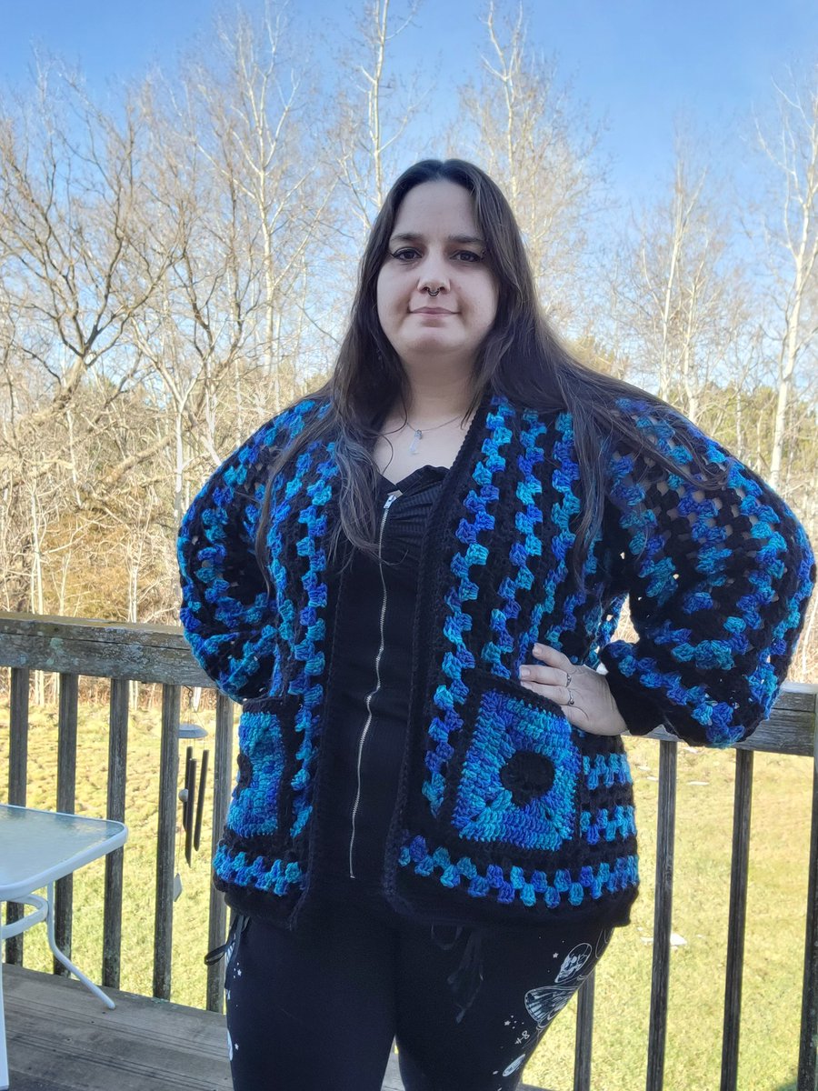 Mythic_Phoenix's tweet photo. I finally got around to making a granny hexagon cardigan and I love how it came out!

Yes the pockets have skulls on them💙 https://t.co/iUU6E8BO0X