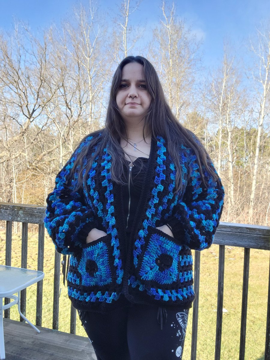 Mythic_Phoenix's tweet photo. I finally got around to making a granny hexagon cardigan and I love how it came out!

Yes the pockets have skulls on them💙 https://t.co/iUU6E8BO0X