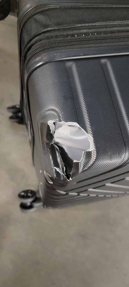 grant_hinkle's tweet photo. @AmericanAir  after waiting 45 minutes for our luggage we discovered you guys absolutely destroyed my luggage at the Charlotte,  NC Airport and your employees told me to drive to Raleigh, NC to ship it to Dallas to get fixed. Never flying American again https://t.co/rZ24FFOJEX