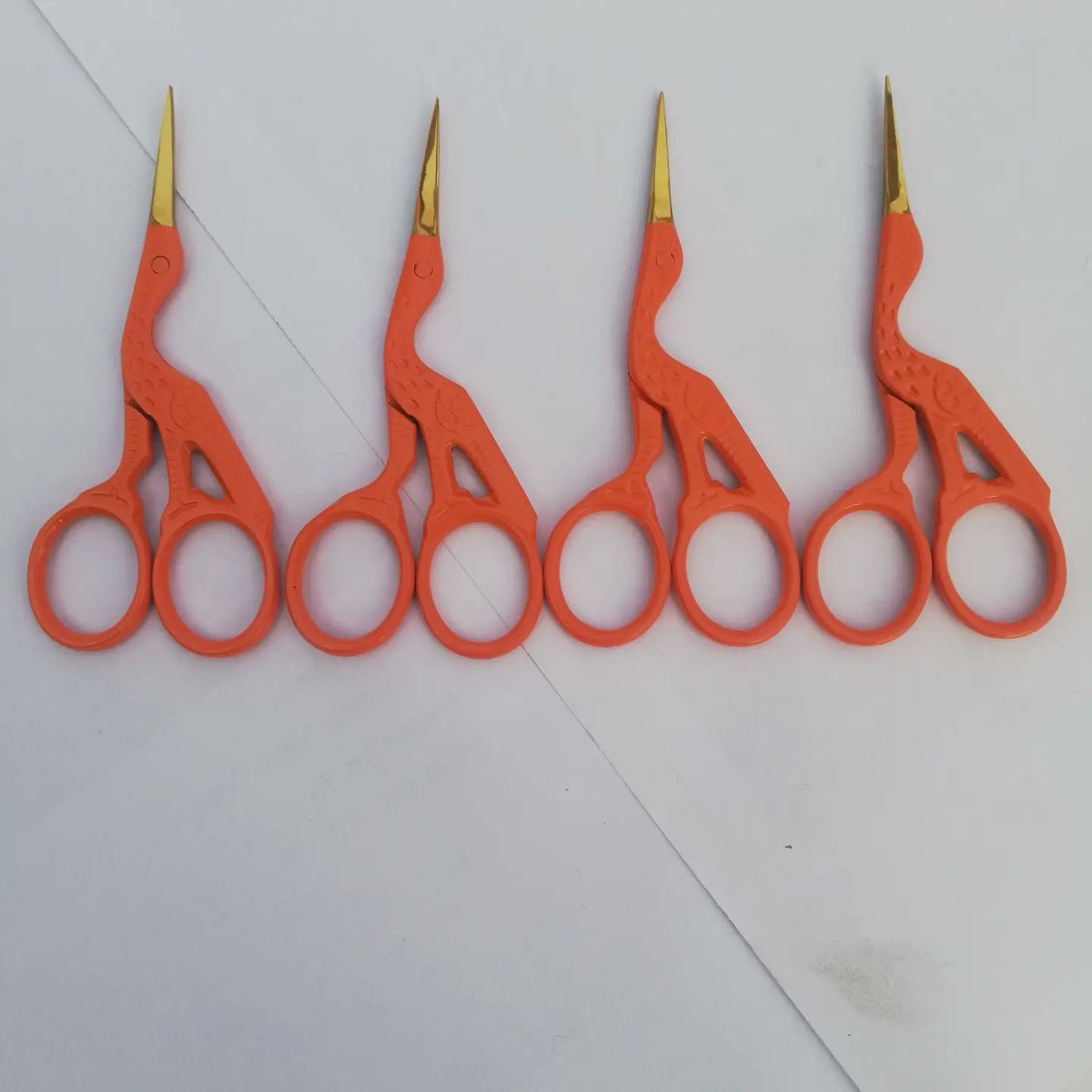 rizwanbhally's tweet photo. Stork scissors with orange and gold tip https://t.co/b2mKs4yewQ