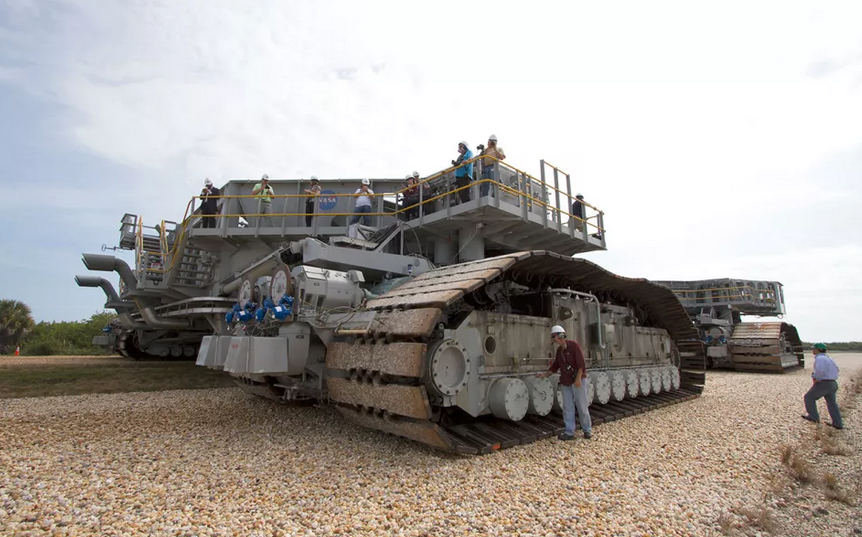 The Crawler looks like something out of Star Wars. The same Crawler that transported Saturn V rockets to the launch pad during Apollo was used to carry the SLS for the Artemis-1 launch to the pad. 

It's about the size of a baseball infield and weighs more than 6M lbs (2.7M kgs)!