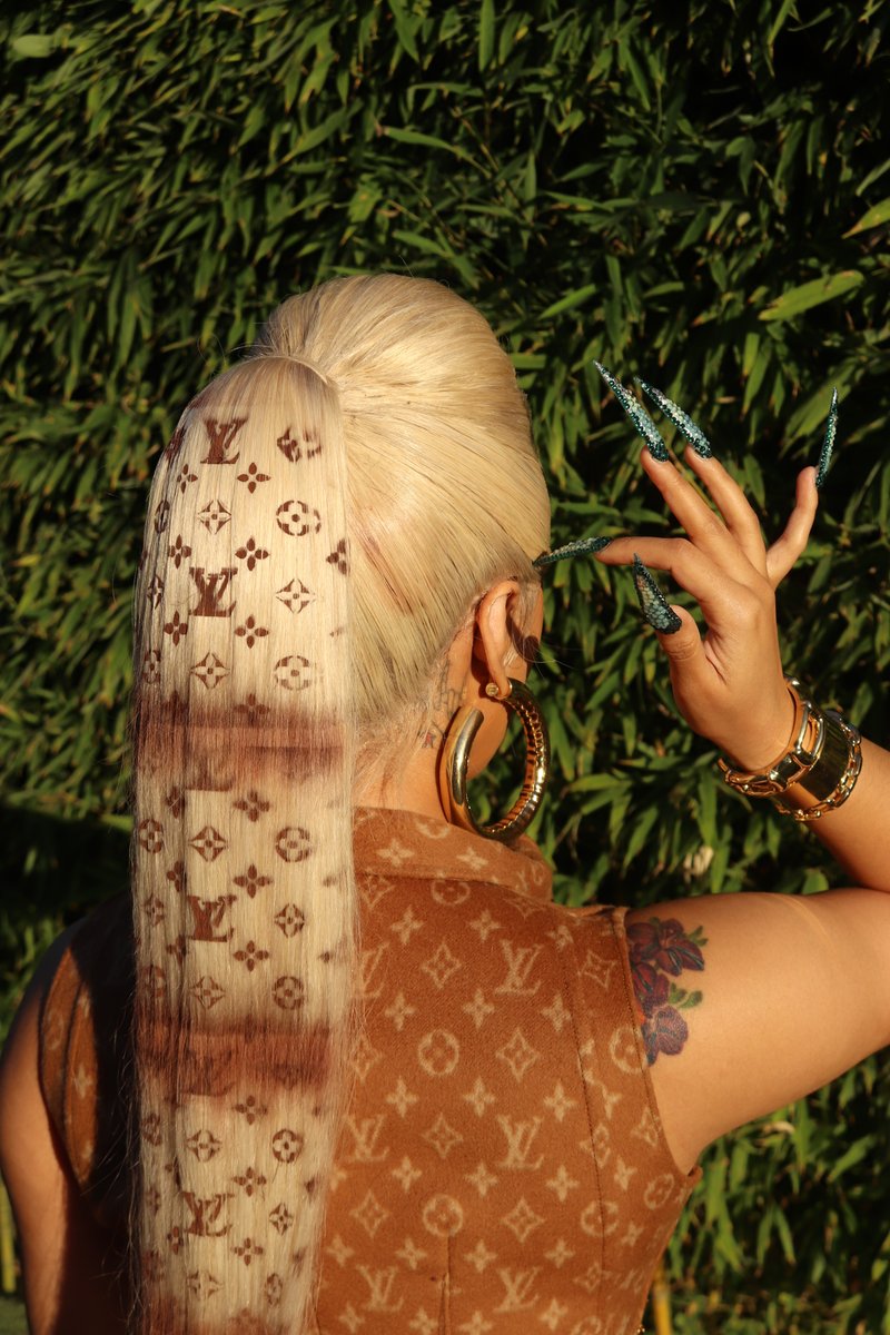 Cardi B's Louis Vuitton printed hair.