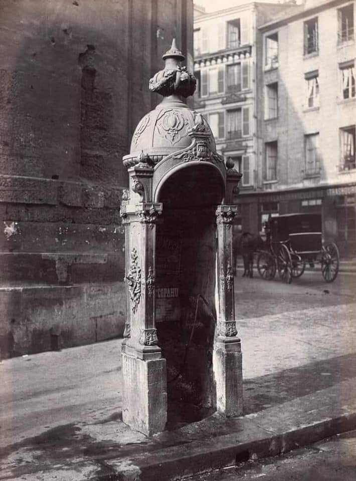 Public urinal, Paris, 1875.⁣ Structures like this could be found on the streets of Paris in the late 19th century.
