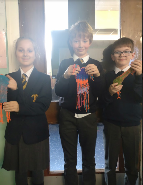 EagleshamPS's tweet photo. As part of our Viking topic, we learned all about how the Vikings made clothes. This meant Primary 6 were able to have a go at weaving themselves!  #EPSCreativity https://t.co/DlsxjpoJsn