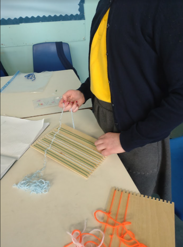 EagleshamPS's tweet photo. As part of our Viking topic, we learned all about how the Vikings made clothes. This meant Primary 6 were able to have a go at weaving themselves!  #EPSCreativity https://t.co/DlsxjpoJsn
