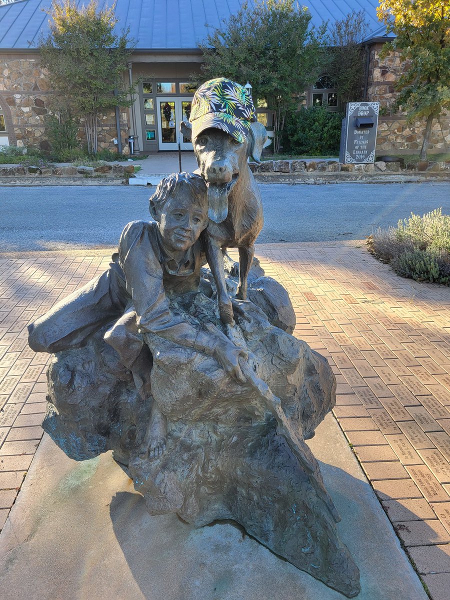 Old Yeller statue in author Fred Gipson's hometown of Mason TX. And Old Yeller wearing my hat.