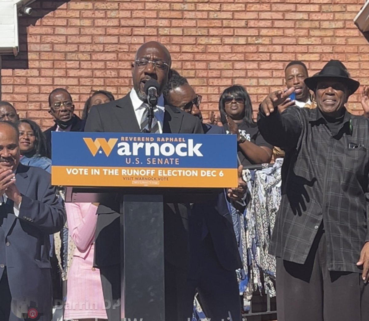 DarrinDPayne's tweet photo. @ReverendWarnock It was an honor and privilege to walk with you to the polls today. My sons and I are inspired to #VoteBlue and #ReElectWarnock https://t.co/CvO1nIudV4