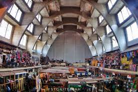 KenyanMuseum's tweet photo. Nairobi City Market was completed in 1932. It was designed by Easton and Robertson Architects. It was modeled along the Lawrence Hall, in Central London, that had been designed by the same Architects and constructed between 1925-1928.  (Left: City Market, Right Lawrence Hall). https://t.co/H3f2XdXW7C