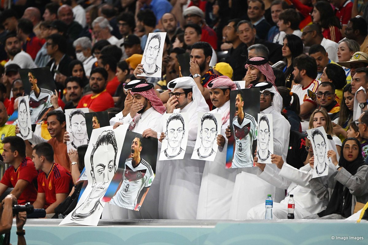 dw_sports's tweet photo. Spectators at Germany's game against Spain mimicked the German national team's protest to highlight the DFB's handling of Mesut Özil's exit from the national team. 

#ESPGER https://t.co/Na6E86F6Zv