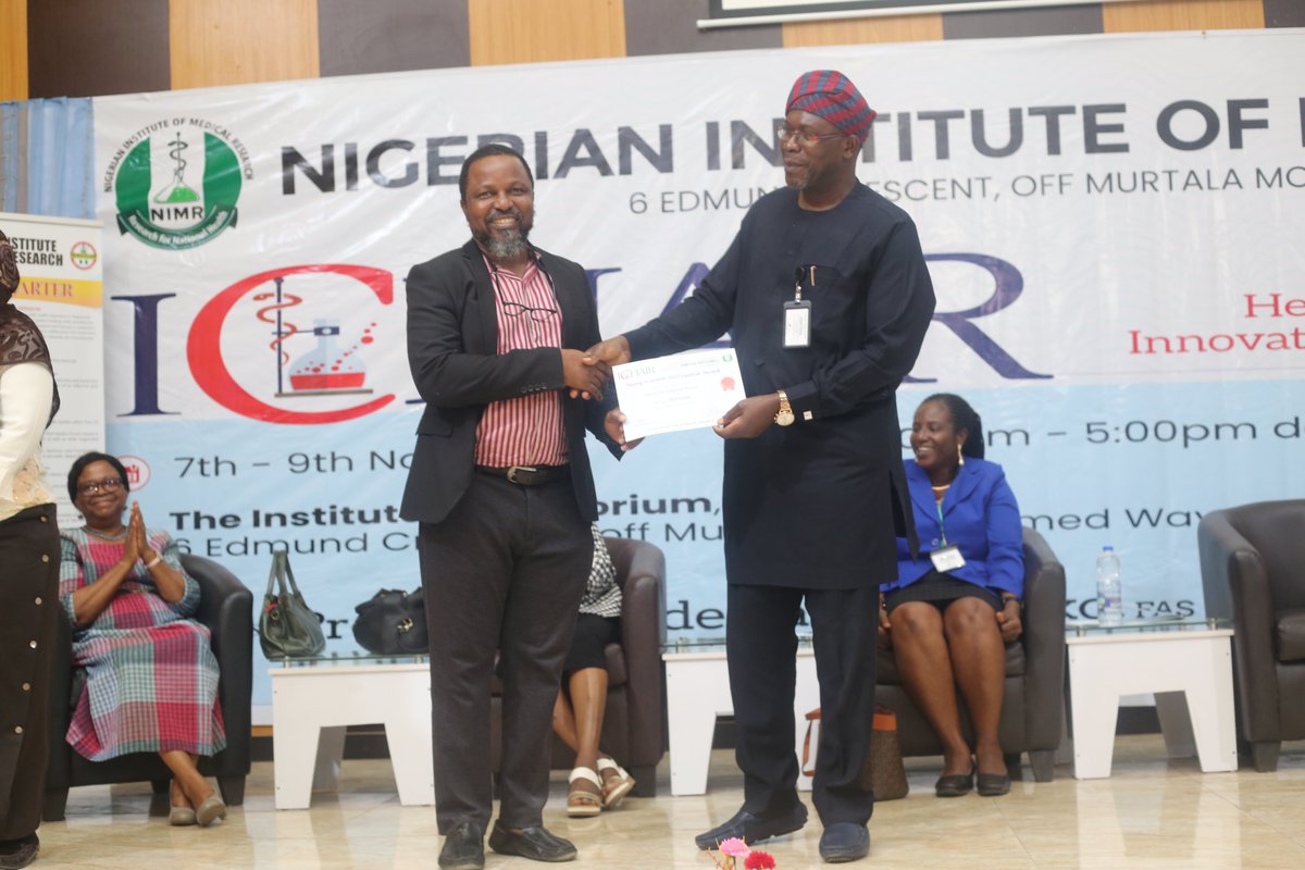 IchairN's tweet photo. Dr Samuel Amoo @amoo_olufemi, winner of the Director-General's Young Scientist Award at the #ICHAIR2022. The award was  presented by the DG @nimrnigeria Prof Salako. @MicrobioNIMR @NIMR_Foundation @AlikoDangoteFdn @APINNigeria @UnilagNigeria @APINNigeria @Fmohnigeria @NCDCgov https://t.co/YaVP5oTHHI