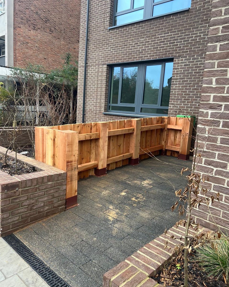 The Pro Landscapes team created this lovely bin storage in South London using red cedar timber installed in a hit &amp; miss style #Timber #BinStorage #HardLandscaping