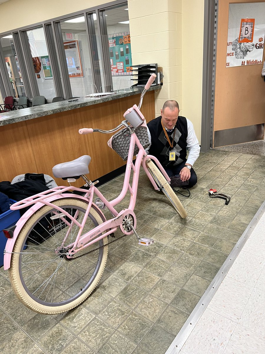 RosenbloomTMS's tweet photo. Middletown North is lucky to have Mr. Trezza. The guy does it all! Filling up air in a student’s bike tires today! https://t.co/xHLFGJVIhw