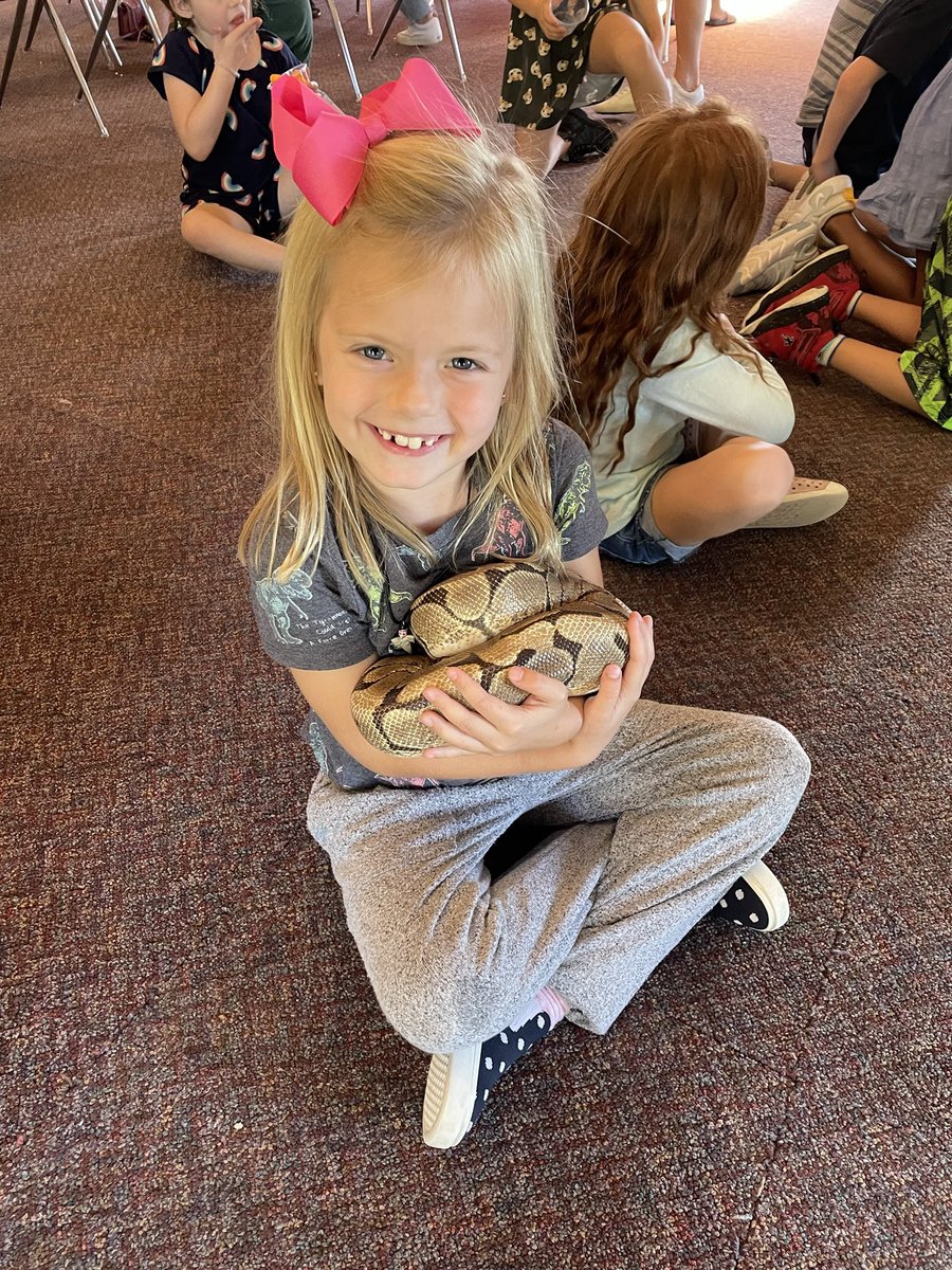 Clara Honor… how are you 8? You’re smart, confident &amp; a force. You have twinkly eyes &amp; a giant heart. You spend the majority of the day in a handstand. You give the best hugs. You are FEARLESS. 

Happy bday to our best girl. And, yes, that boa constrictor is sleeping in her arms