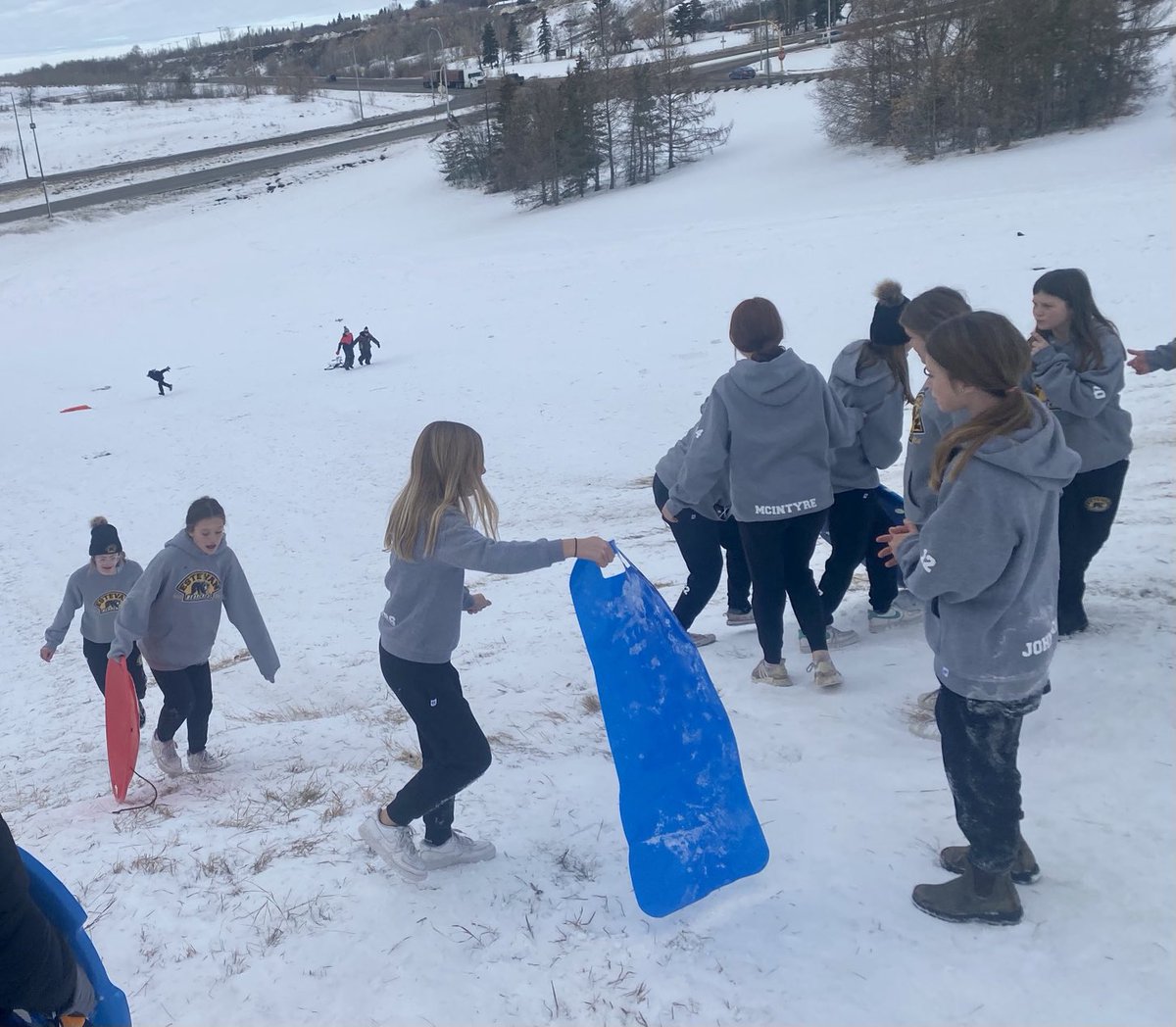 EBearcats's tweet photo. Sledding may not be the best way to get rid of bus legs, but it may be the most fun! Thanks to the kids in North Battleford who loaned us their sleds https://t.co/Q2sSFnzJZs