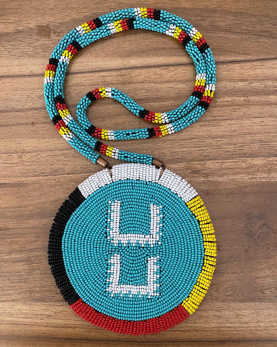 Anthrobeader's tweet photo. Another one done. A couple years ago, I made a wáwya bag and was inspired to make a necklace. The #wáwya is the symbol for counting coup and it’s surrounded by the #MedicineWheel. A simple design but I love that blue.
#beaded #beading #CountingCoup #NezPerce #NezPerceBeading https://t.co/QVw1AS4hlv