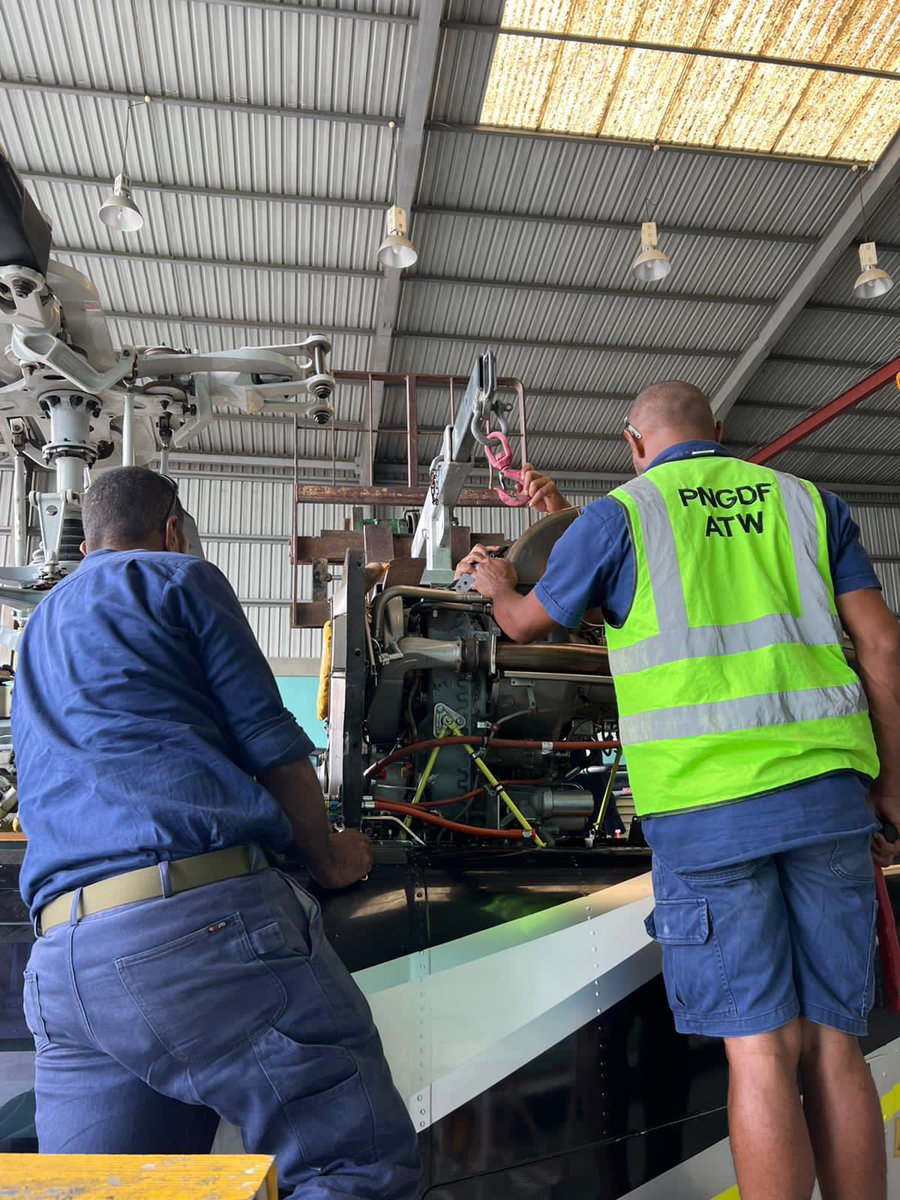 ADFinPNG's tweet photo. Some of the #PNGDF Air Transport Wing maintenance crew embedded with local contractors got to build new skills recently by participating in an engine exchange on a Bell 407. The #PNGAusPartnership continues to further capability for ATW. @DefenceAust @AusHCPNG https://t.co/MLSB0xWBcA