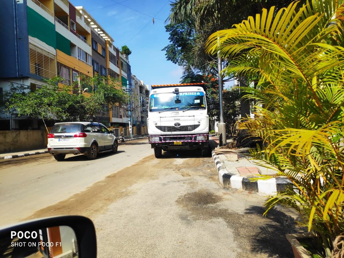 0RRCA's tweet photo. On this road from Ecoworld to AET Junction, a lot of Trucks are parked creating a traffic pile up in this critical arterial road, Request concerned BTP official to please look into this @blrcitytraffic https://t.co/ljilWsn7kw