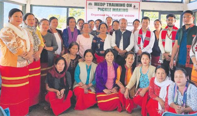 MyGovArunachal's tweet photo. A 15-day Micro Enterprise Development Program on pickle making, implemented by the NGO Future Vision, started yesterday at Romdung village in East Siang district. During the program, attendees will learn how to make, package, and sell pickles properly. https://t.co/nSY0kAejvB