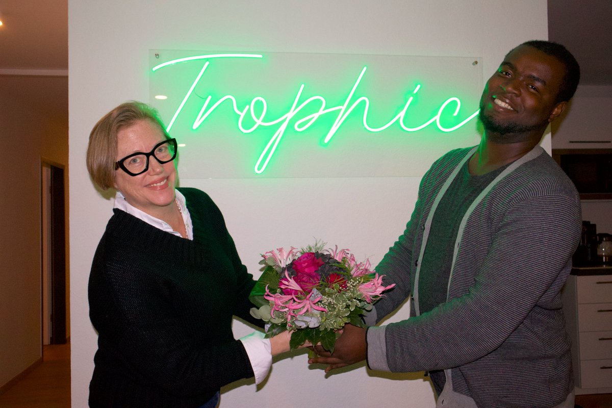 A belated, but very happy birthday to our "Trophic Twins," Desmond &amp; Gretchen! As you can see, these two brighten any room (much like our neon Trophic sign) with their smiles and positive energy. We had a great time celebrating you both in the office. Cheers!
🎂💐🍾
