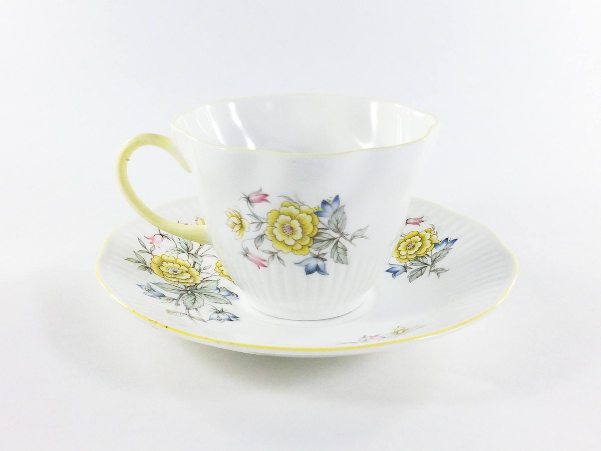 Teacup and Saucer Queens Rosina Fine Bone China Yellow Floral Made in England, Floral Teacup, Flower Teacup, China Teacup, Vintage Tea Cup etsy.me/3ub9U6k #white #yellow #no #ceramic #teacup #floralcup #yellowflowers #queensrosina #finebonechina