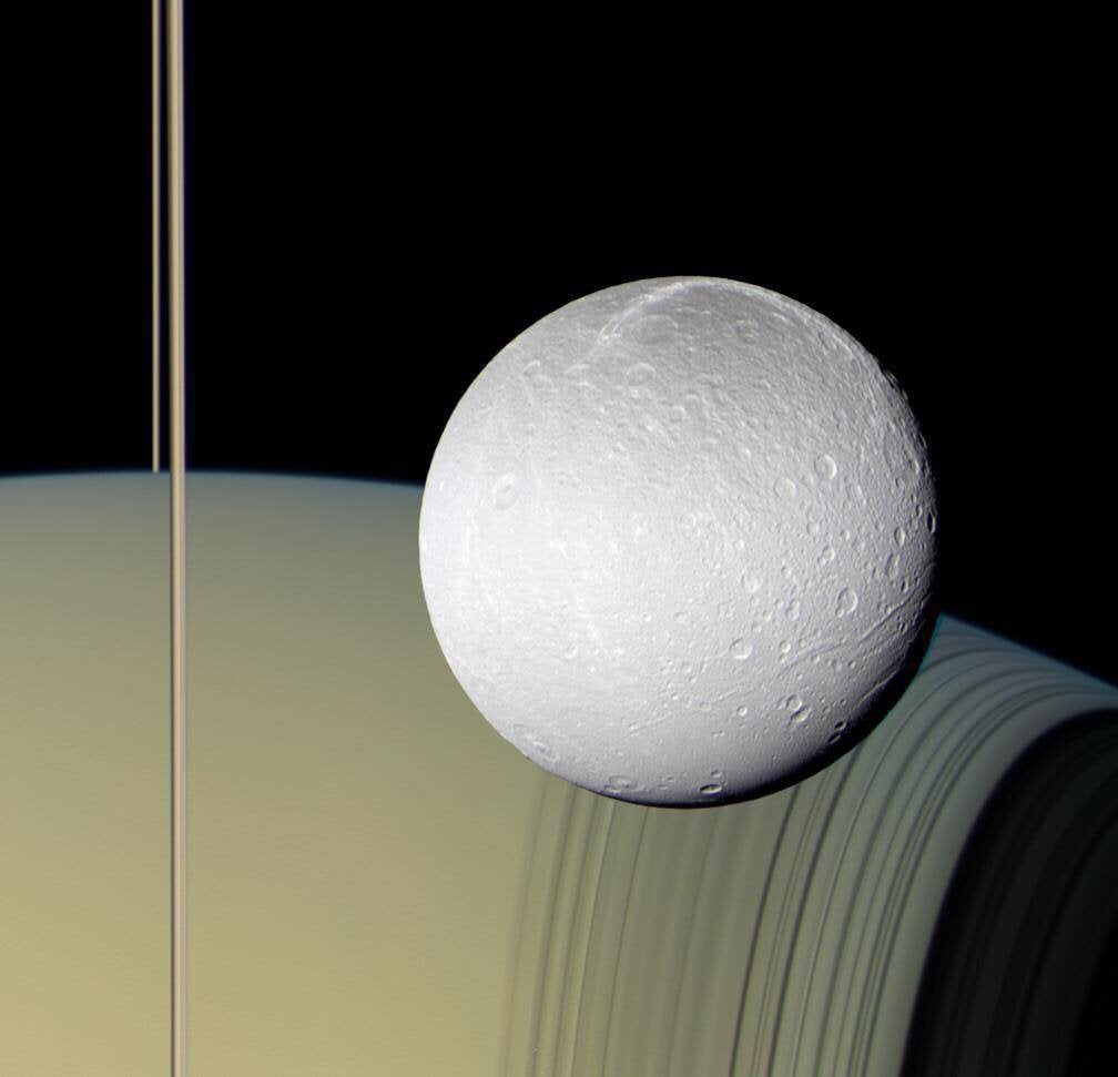 CosmicBot_'s tweet photo. "This shot of Saturn &amp; Dione" #Astronomy #Space https://t.co/YQ4nitcAlB
