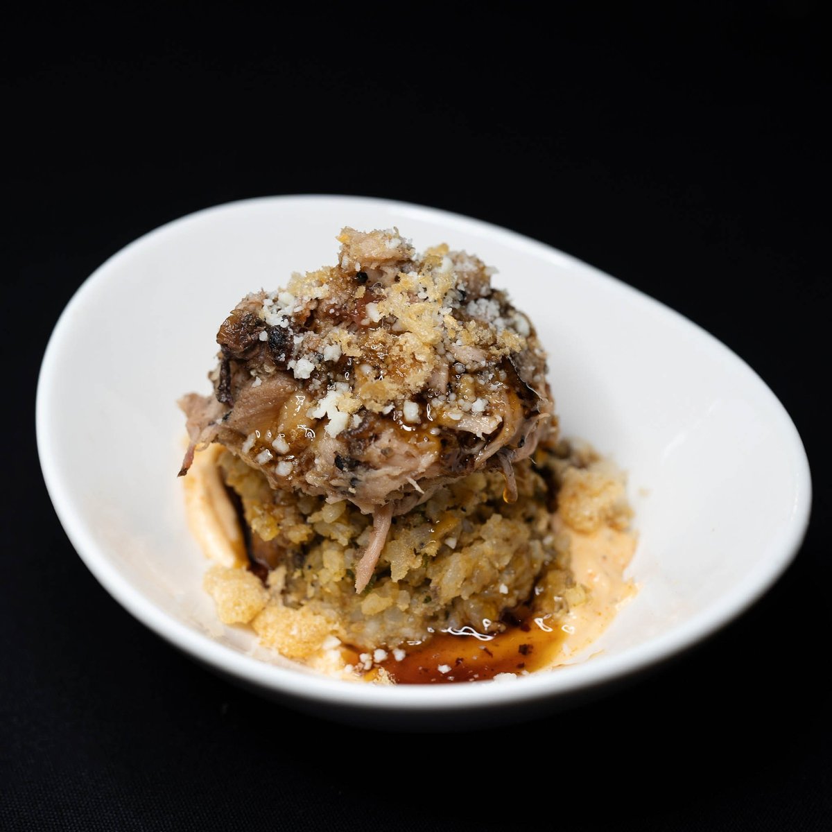 HouBBQ's tweet photo. Daddy Duncan's BBQ: Smoked dirty rice &amp; pulled pork with a blood orange glaze, garlic aioli, fried cracklin's &amp; cotija cheese. *PPl's Choice Champion. 🥇 2022 HOUBBQ Throwdown! Nov. 20th, Saint Arnold Brewing Co. @saintarnold. Photo credit: @subtlefoodie #2022houbbqthrowdown 4/13 https://t.co/S9xbuiWTfC